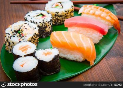 assorted japanese sushi food. All you can eat menu. Maki and rolls with salmon, tuna and shrimp