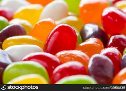 Assorted mix of colorful candies and jellies. Selective focus.