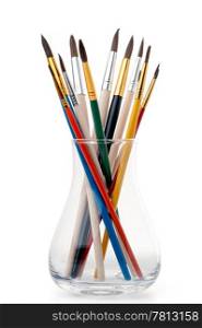 Assorted paintbrushes. Group of paintbrushes in a glass jar