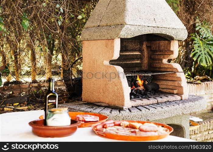 assortment meat near outdoor barbecue. High resolution photo. assortment meat near outdoor barbecue. High quality photo