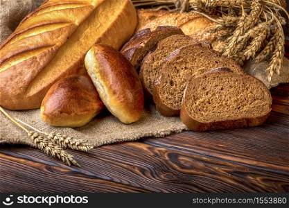 Assortment of bakery on wooden table close up. Assortment of bakery
