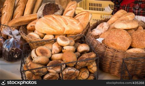 Assortment of bread in the shop. Different fresh bread on market.