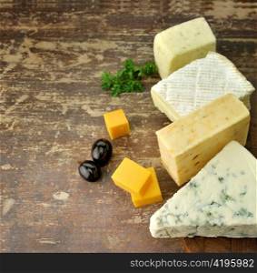 Assortment of Cheese On A Cutting Board