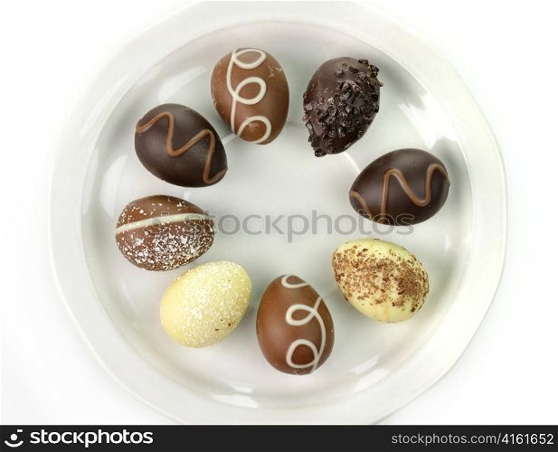 assortment of chocolate eggs on a plate