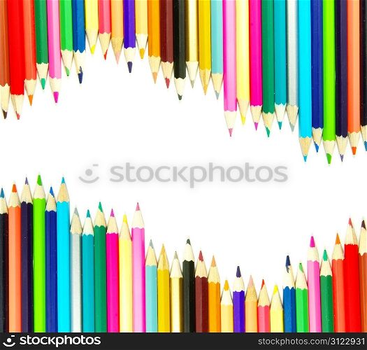 Assortment of coloured pencils on white background