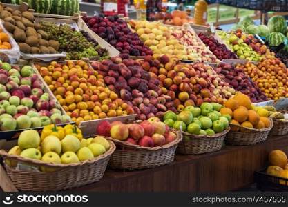 Assortment of fresh fruits at the market. Assortment of fruits at market