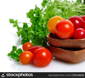 Assortment Of Fresh Small Tomatoes And Herbs
