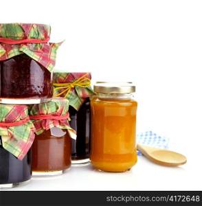 assortment of homemade jam in the glass jars