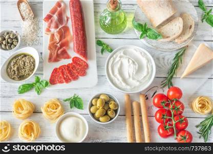 Assortment of Italian foods on the wooden table