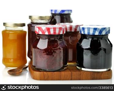 assortment of jam in the glass jars