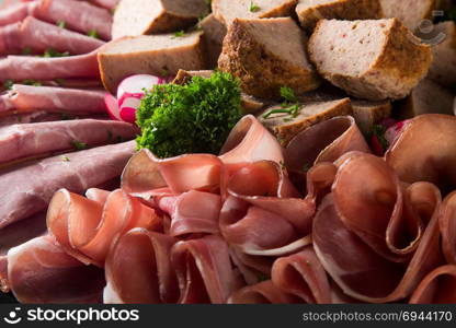 Assortment of meat delicatessen on a plate