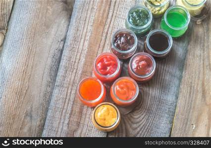 Assortment of sauces in the glass jars