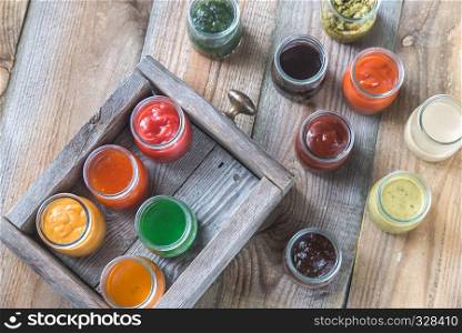 Assortment of sauces in the glass jars