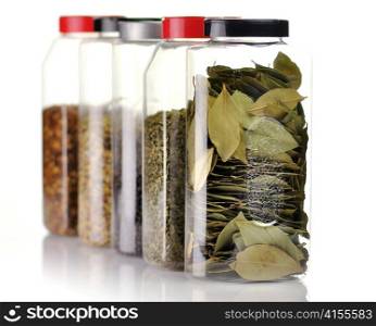 assortment of spices in the plastic bottles