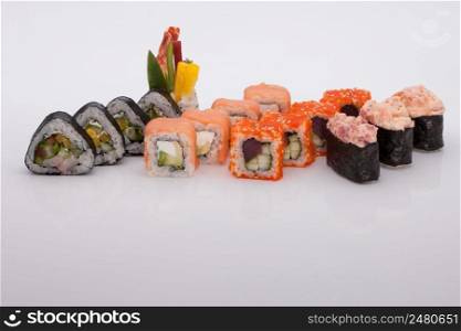 assortment of sushi on a white background. Sushi on a white background