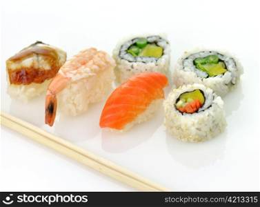 assortment of sushi on white background , close up