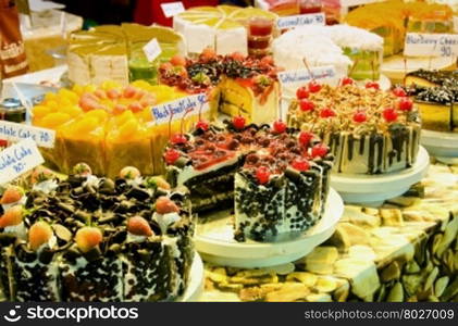 assortment of sweets on counter in market
