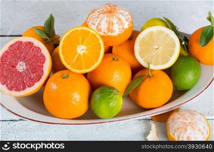 Assortment on a tray fresh seasonal fruit acid