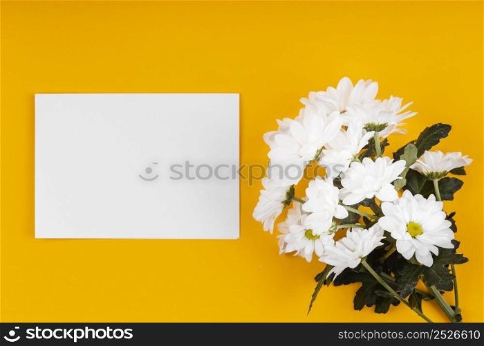 assortment white flowers with empty card