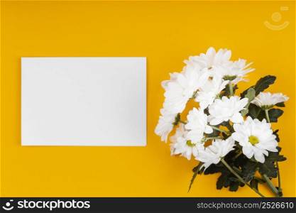 assortment white flowers with empty card