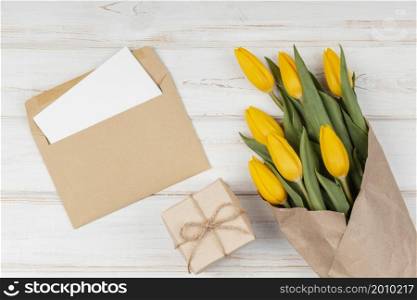 assortment yellow tulips with card envelope