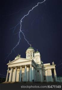 Assumption Cathedral in Helsinki. Finland. Northern Europe. Powerful lightning strike.. Cathedral in Helsinki