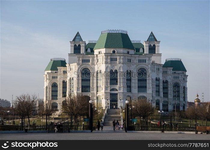 Astrakhan, Russia 12 of April 2018  Front View Of New Astrakhan Opera Theater In Sunny Spring Day With People Walking.. Astrakhan, Russia 12 of April 2018  New Astrakhan Opera Theater In Sunny Spring Day With People Walking.