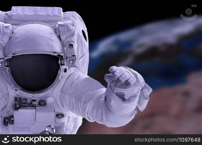 astronaut and earth background, Elements of this Image Furnished by NASA
