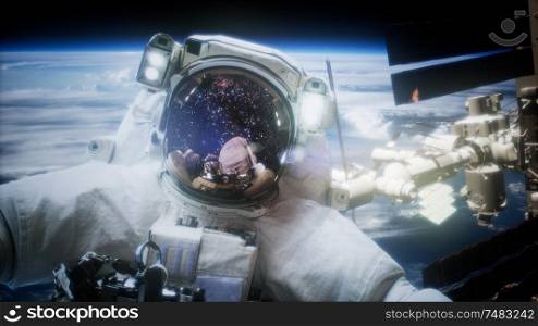 Astronaut at spacewalk. Elements of this image furnished by NASA