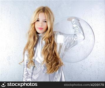Astronaut futuristic kid girl with silver uniform and glass helmet