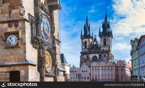 Astronomical clock in the old square of Prague with the church of the Virgin Mary of Tyn.