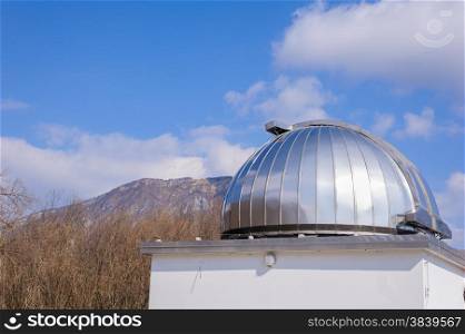 Astronomical observatory, on the blue sky