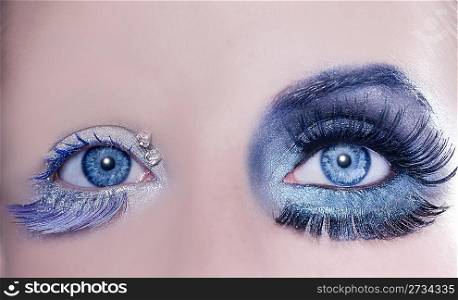 asymmetrical blue eyes makeup macro closeup silver winter fashion