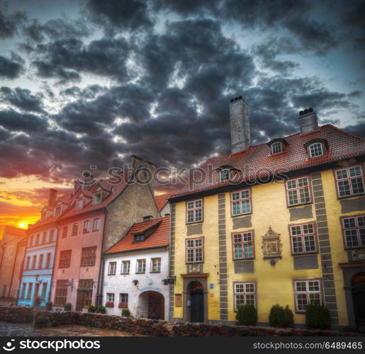 At night the moon and stars shine. old houses on Riga street. Latvia. Europe. old houses on Riga street. Latvia