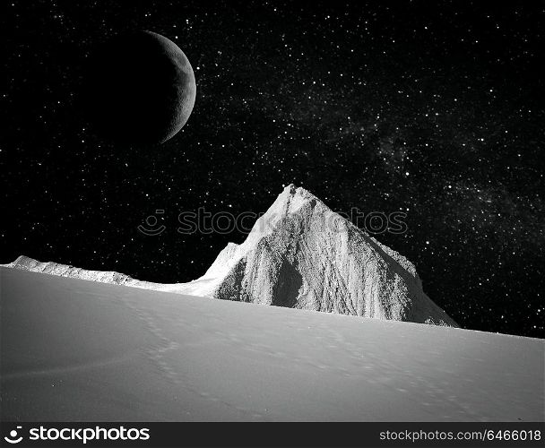 at night the moon shines over the mountain
