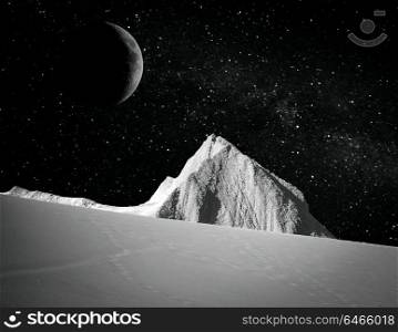 at night the moon shines over the mountain