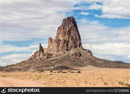 Atathla Peak, an extinct volcano sometimes called El Capitan, in Monument Valley on the Navajo Reservation of Northern Arizona.