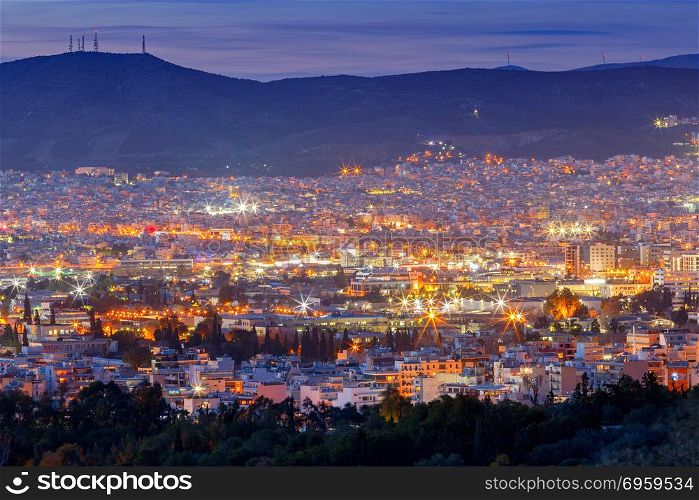 Athens. Aerial view of the city.. Aerial view of Athens from hill on the sunset. Greece.