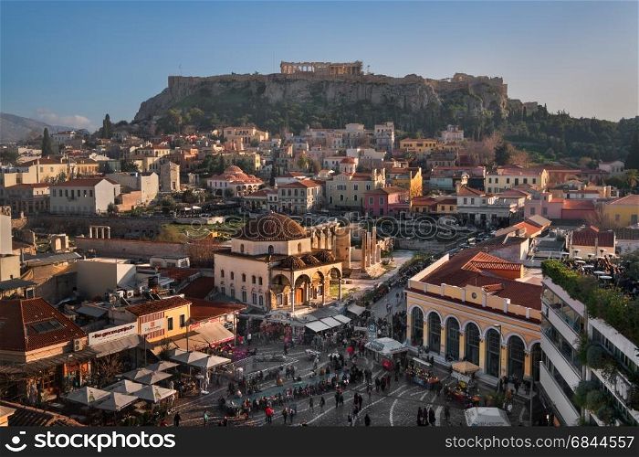 ATHENS, GREECE - FEBRUARY 24, 2017: Aerial View of Monastiraki Square and Acropolis in the Evening, Athens, Greece. Monastiraki is a flea market neighborhood in the old town of Athens.