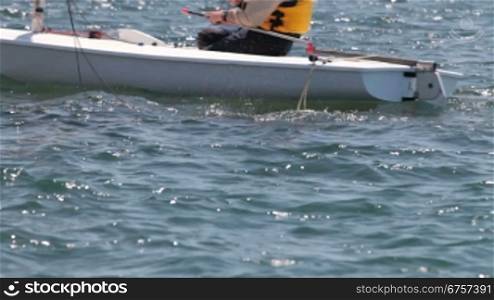 athlete on sailing boat