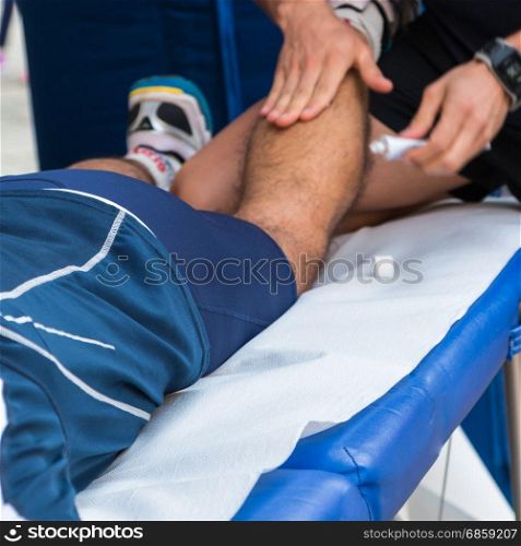 Athlete&rsquo;s Calf Muscle Professional Massage Treatment after Sport Workout, Fitness and Wellness