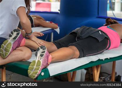 Athlete&rsquo;s Calf Muscle Professional Massage Treatment after Sport Workout: Fitness and Wellness