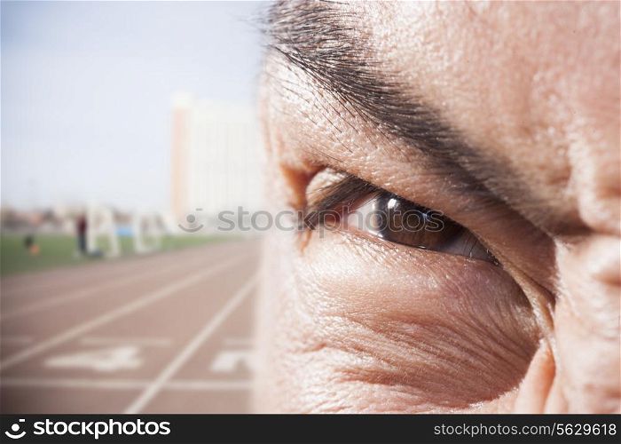 Athlete&rsquo;s eye with angry expression, close-up