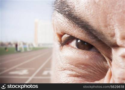 Athlete&rsquo;s eye with angry expression, close-up