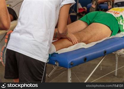 Athlete's Muscles Massage after Sport Workout.. Athlete's Muscles Massage after Sport Workout