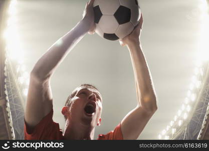 Athlete with soccer ball