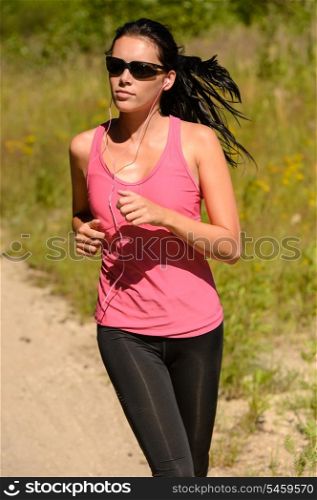 Athlete woman running training on sunny day with sunglasses