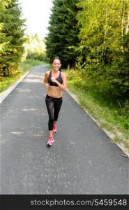 Athlete woman training for running race outdoor on sunny day
