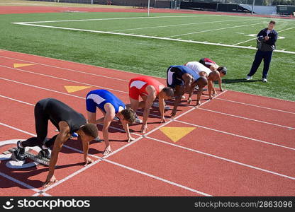 Athletes ready to run, high angle view