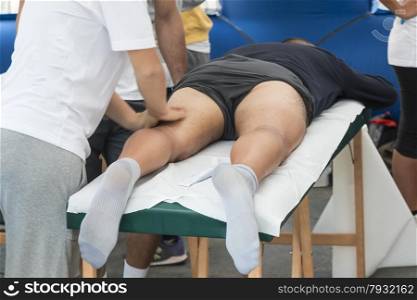 athletes relaxation massage before sport event